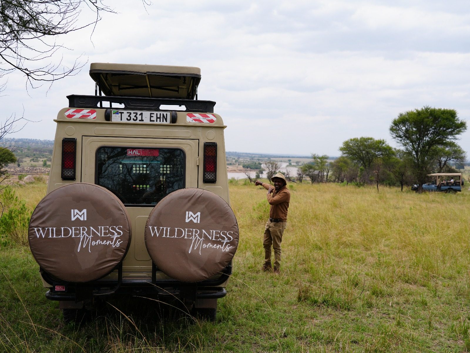 Wilderness Moments safari vehicle exploring the Serengeti
